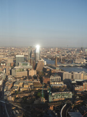 aerial view of London city skyline and river Thames looking down from the Shard at sunrise