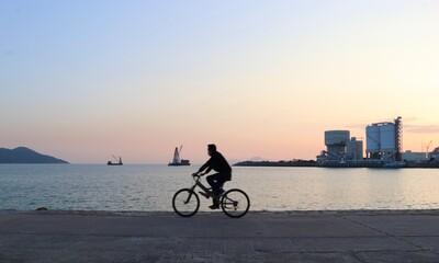 Fototapeta premium person riding a bike