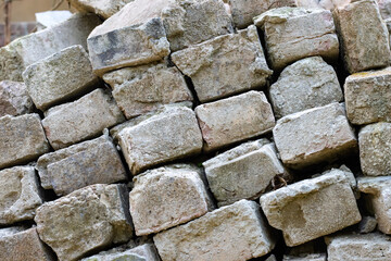 Rows of used old bricks close up