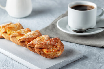 Homemade baking, homemade cookies with cottage cheese and a cup of coffee on gray background