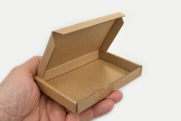 Small shallow paper box for jewelery or battery