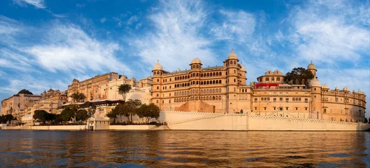 Panoramic view of the Udaipur City Palace from lake Pichola in Rajasthan, India © Zzvet