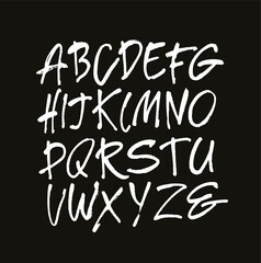Vector Acrylic Brush Style Hand Drawn Alphabet Font. Calligraphy alphabet on a black background. Ink hand lettering.