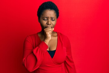 Fototapeta na wymiar Young african woman with afro hair wearing casual clothes over red background feeling unwell and coughing as symptom for cold or bronchitis. health care concept.