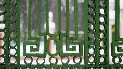 forged metal fence in winter