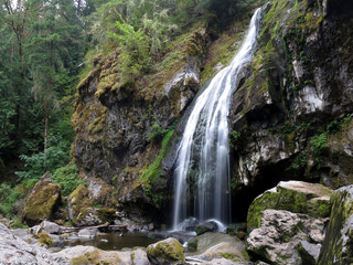Delicate Waterfall and Mossy Rocks