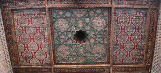 Khiva, Uzbekistan - December 02 2019: Ancient khiva Tash hauli palace ornaments. Interior decoration of the Tosh-Hovli palace