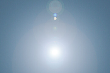 Blue background, denim jeans background. Digital Natural lens flare..