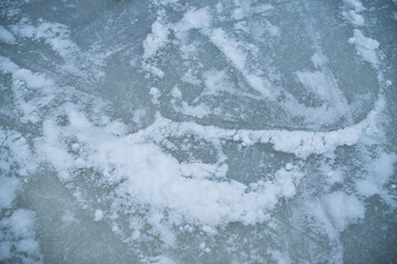 Ice surface texture on a blue wallpaper. macro shot 