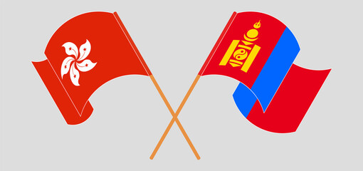 Crossed and waving flags of Hong Kong and Mongolia