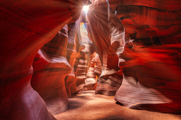Beautiful wide angle view of sandstone formations in famous Antelope Canyon on a sunny day filtering light rays, Page, American Southwest, Arizona, USA. - obrazy, fototapety, plakaty
