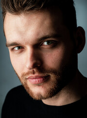 Obraz premium Close up face of Handsome young man. Fashion male model.