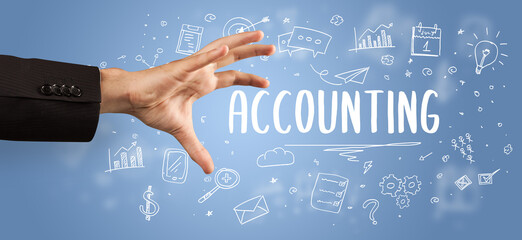 Close-Up of cropped hand pointing at ACCOUNTING inscription, modern business solution concept