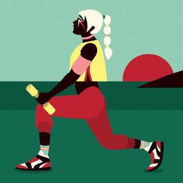 Woman is working out in the sunset