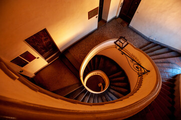 View of a wood spiral staircase.