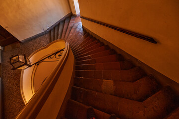 View of a wood spiral staircase.