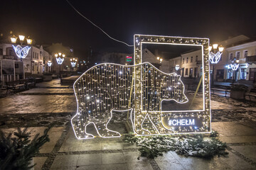 Chelm, Poland, January 9, 2021: View of the city streets in the evening in the winter period after Christmas.