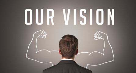 Rear view of a businessman with OUR VISION inscription, powerfull business concept