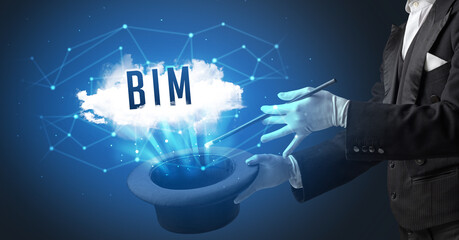 Magician is showing magic trick with BIM abbreviation, modern tech concept