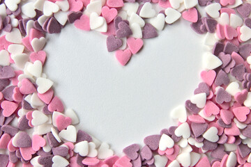 Delicious pink Valentine's Day sugar hearts and ornaments in pink, purple and white show I love you...