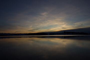 Fototapeta na wymiar colorful sunset over the lake of pfaeffikon (Pfäffikersee)