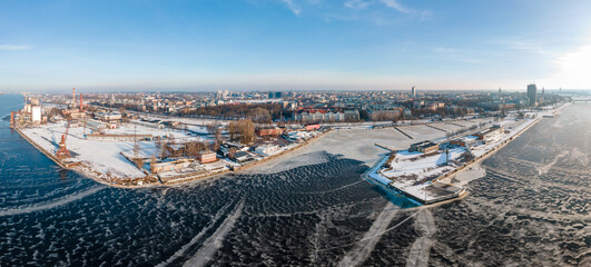 Aerial Panorama view of the Riga free port Andrejsala in winter