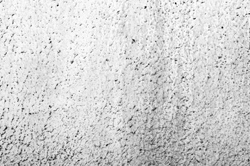 Texture of a concrete wall with cracks and scratches which can be used as a background
