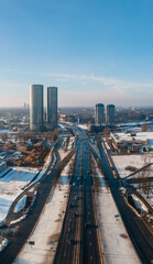 Fototapeta na wymiar Aerial view to Z-Towers and road in Riga in winter