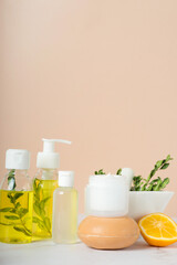 An image of a bottle of olive oil, lemon, spa