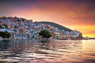 View of town and port at the island Skopelos, northern Sporades, Greece - obrazy, fototapety, plakaty