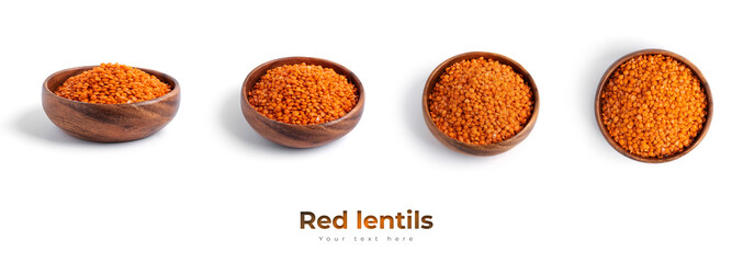 Red lentils in a wooden bowl isolated on a white background.
