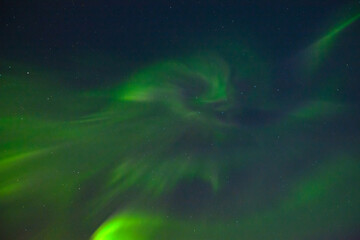 Aurora borealis in the sky at night.