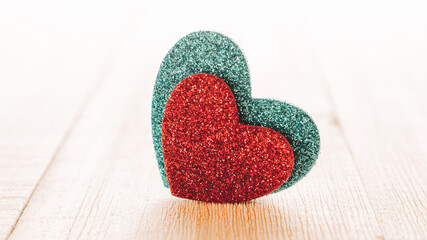 Fototapeta premium Valentines day minimal: red love hearts candle on wooden background. Sainte Valentine, mothers day, birthday greeting cards, invitation, celebration concept.