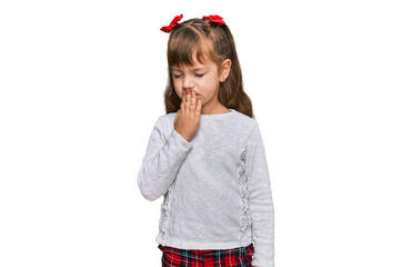 Little caucasian girl kid wearing casual clothes bored yawning tired covering mouth with hand. restless and sleepiness.