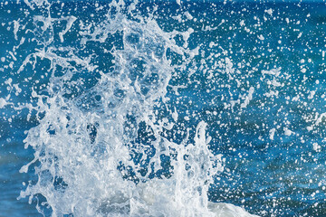 Wave of the sea water at sunny day time.