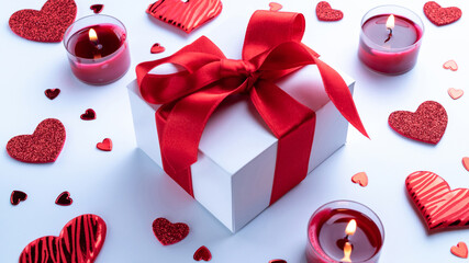 Valentine day beautiful. Romantic gift box, red love hearts, candle on white background. February romance present card.