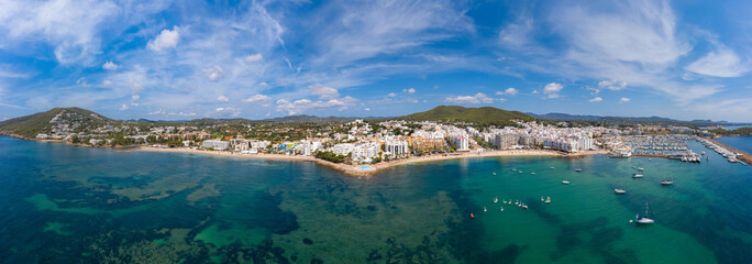 Panoramic high resolution wide aerial photo of the beach front in Ibiza in Spain, showing the...