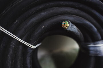 Coiled underground screened cable (five core).