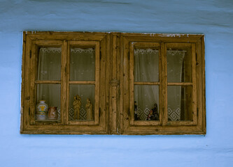 Obraz na płótnie Canvas Close up shot of old wooden hut window.Vlkolinec,traditional settlement village in the mountains.
