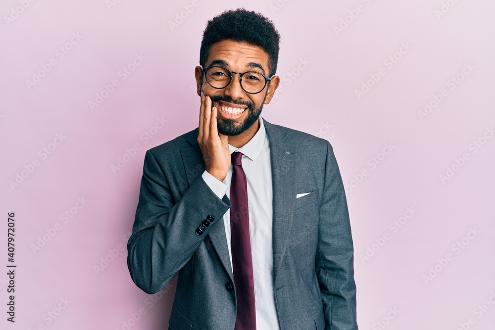 Poster Handsome hispanic business man with beard wearing business suit and tie touching mouth with hand with painful expression because of toothache or dental illness on teeth. dentist