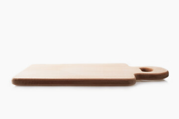 Close-up of a wooden cutting board isolated on white background