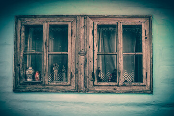 Close up shot of old wooden hut window.Vlkolinec,traditional settlement village in the mountains.