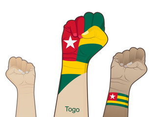 The spirit of struggle by lifting a hand with the Togolese flag