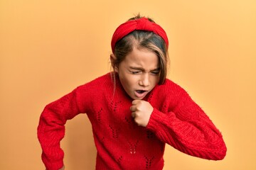 Little beautiful girl wearing casual winter sweater feeling unwell and coughing as symptom for cold or bronchitis. health care concept.