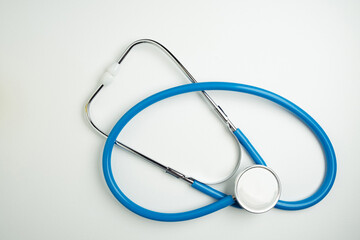 Blue stethoscope or phonendoscope close-up isolated on white background, medicine concept