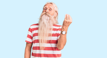 Old senior man with grey hair and long beard wearing striped tshirt doing italian gesture with hand...