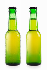Close-up of glass green bottle of beer on a white background. The bottle is closed.