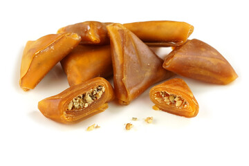 Traditional Turkish sweet pestil or  muska dessert with walnut .