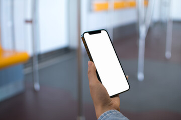 Business people hold smartphone and online shopping concept and BTS Skytrain and public...