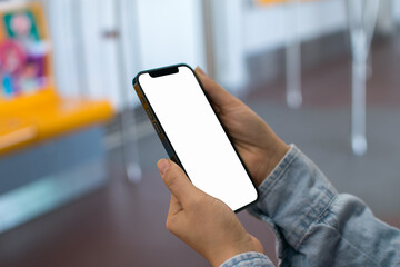 Business people hold smartphone and online shopping concept and BTS Skytrain and public transportation system in Thailand